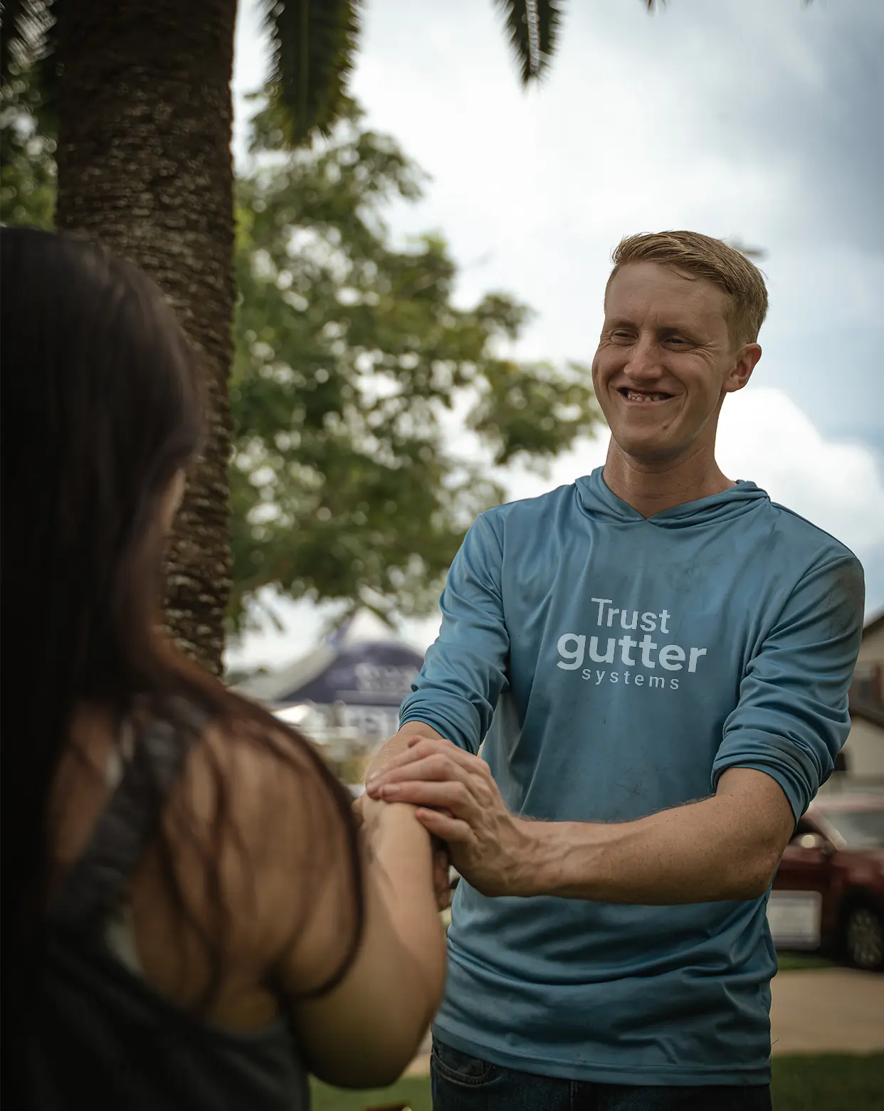 Trust Gutter Systems Employee and Happy Customer